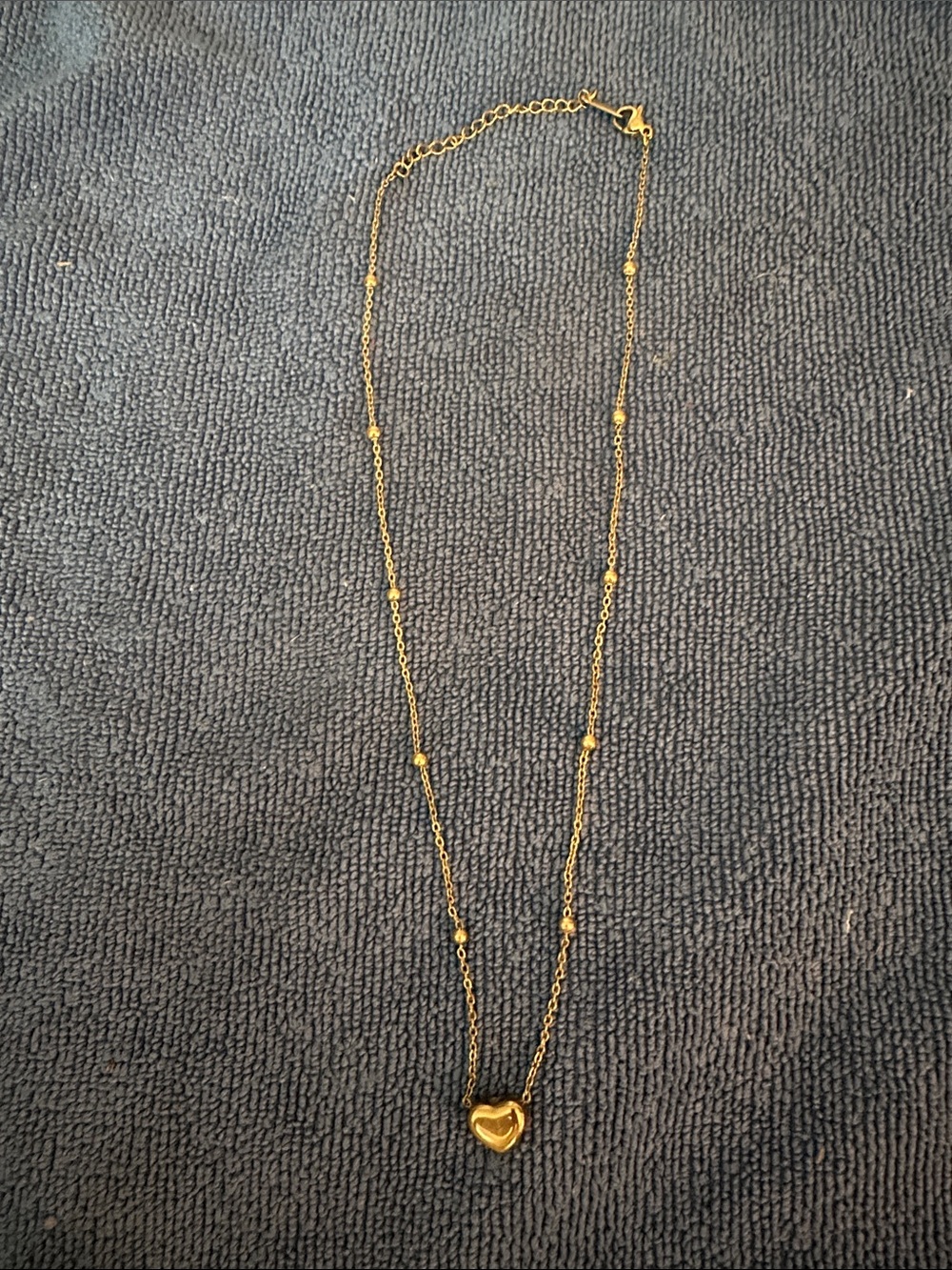 Adjustable length gold tone necklace